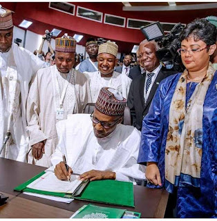 President Muhammadu Buhari President Muhammad Buhari signs an agreement establishing African continental free trade area