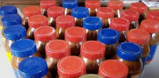 Homemade tomato paste Bottled homemade tomatoes paste