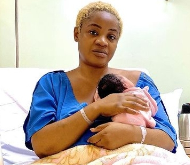 Uche Ogbodo and baby