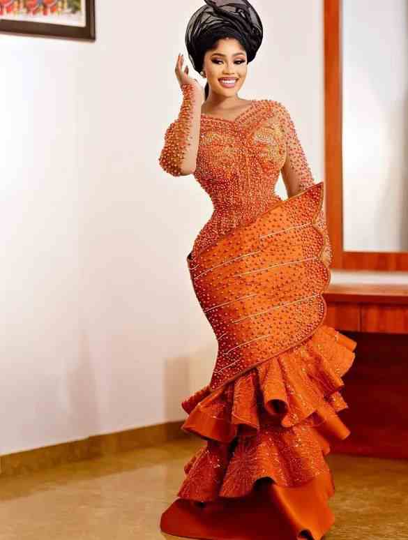 Stunning Burnt Orange Aso Ebi Styles from Ruby Ojiakor's Wedding