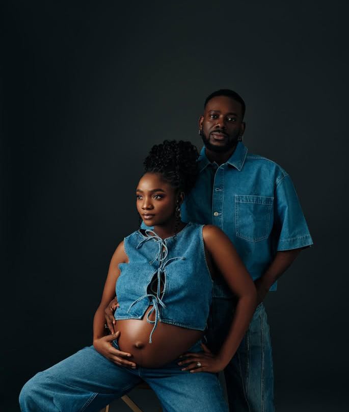 Simi and Adekunle Gold announce second child in matching Denim